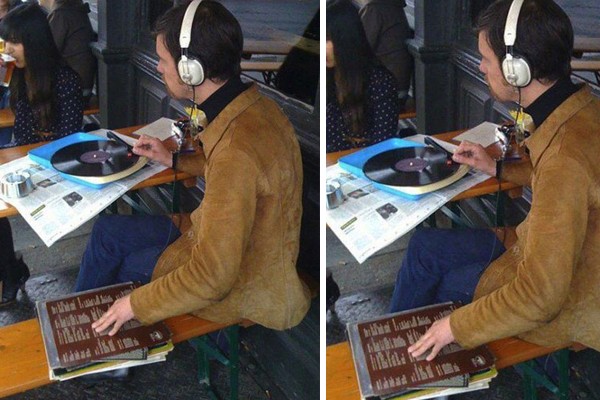 Este hombre escuchando música en un restaurante